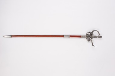 Swept hilt sword with fretted ring...